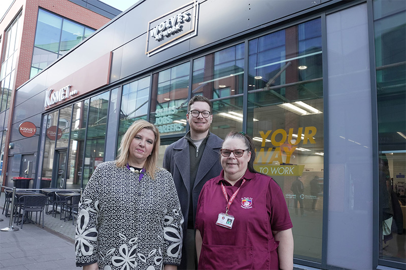(L-R): Residents supported into work Deniza Pavlova, assistant planning officer at City of Wolverhampton Council, and Carol Fox, cleaner at St Paul’s CE Primary School, with Cllr Chris Burden (centre) outside the i10 Jobs, Skills and Careers Hub
