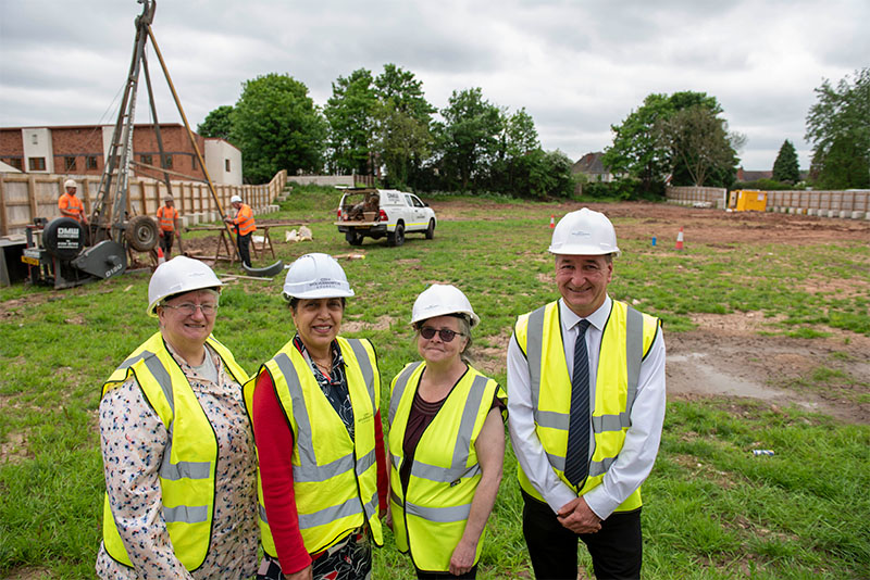 (L-R): Marie Lane, Chair of the Patient Participation Group; Cllr Jasbir Jaspal, Cabinet Member for Adults and Wellbeing, Tracy Dunne, Chair of the Rakegate Tenants and Residents Association, and Cllr Steve Evans, Deputy Leader and Cabinet Member for Housing, observe the start of the site investigation works at the Oxley site.